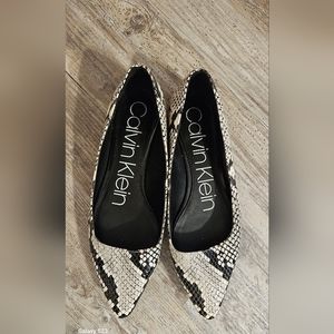 Calvin Klein black and white flats